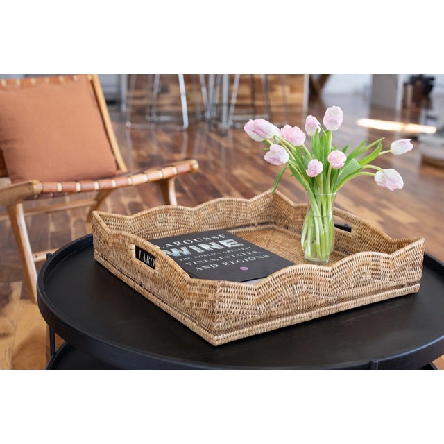 Our Scallop Collection rattan storage baskets, serving trays, and ottoman trays will instantly add a gorgeous touch to any...