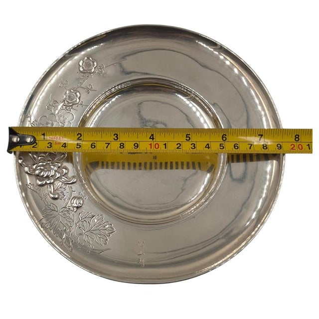 An exquisite mid-century Japanese sterling silver display plate or small tray, retailed by the esteemed silversmiths at...