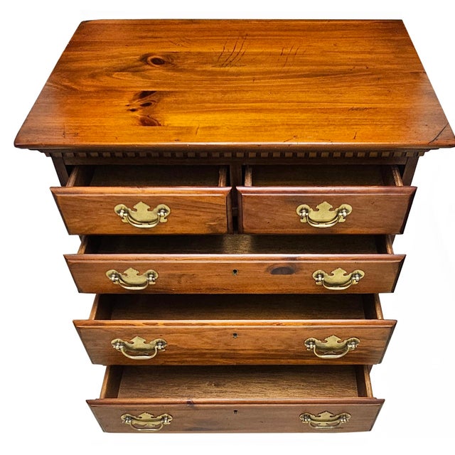 A beautiful solid wood night stand. I believe it is made of Mahogany. Made by the Amish in Hartville Ohio back in the...