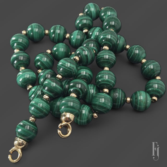 Here is a 24in. Beaded Necklace featuring Malachite Beads with a 14k Yellow Gold Clasp & Accents Length - 24.0 in Total...