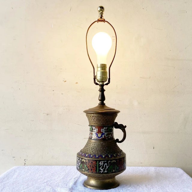 Wonderful vintage Japanese champleve table lamp. Features a brass build with multicolored enamel throughout the center.