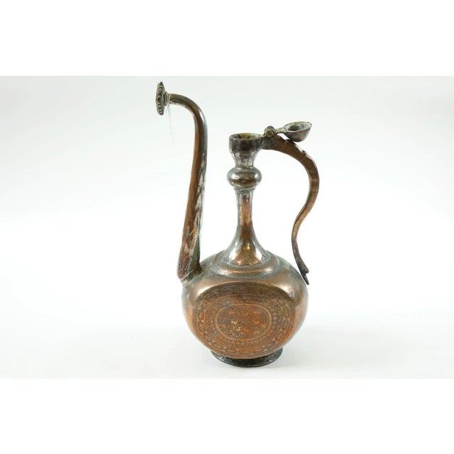 Antique Copper Middle Eastern / Persian Water Ewer – Hand-Carved with Intricate Detail This beautifully crafted antique...