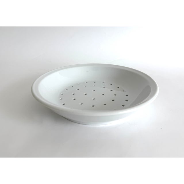 This French faisselle or cheese strainer that date from the late 19th to early 20th century is made of a lovely white...