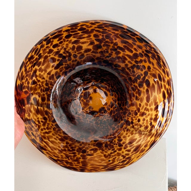 A sleek handblown Italian centerpiece bowl from the '70s in a gorgeous amber tortoiseshell. The sculptural form and smooth...