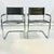 This pair of Tubular Chrome Frame Side Chairs with black leather seats and back rests are from Italy. They are in the...