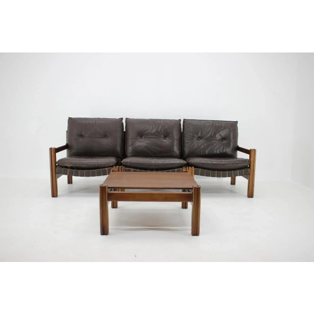 - Leather pillows with signs of use including holes - Wooden parts in good original condition - Can be set up as 2-seat...