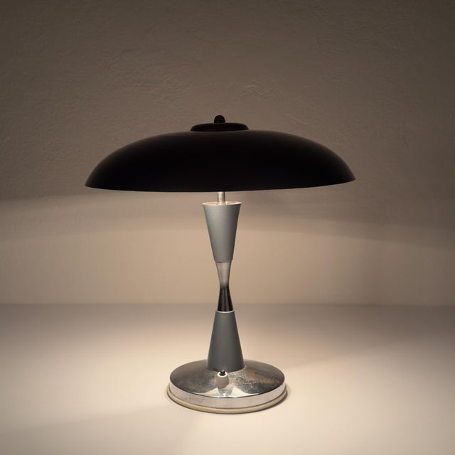 Mid-century industrial metal desk lamp made in Italy in the 1960s. Italian industrial production. In very good condition....