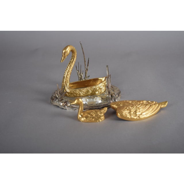 Gilded silver and gold This extraordinary exquisitely detailed mid century hand cast bronze Swan and Cygnet match safe was...
