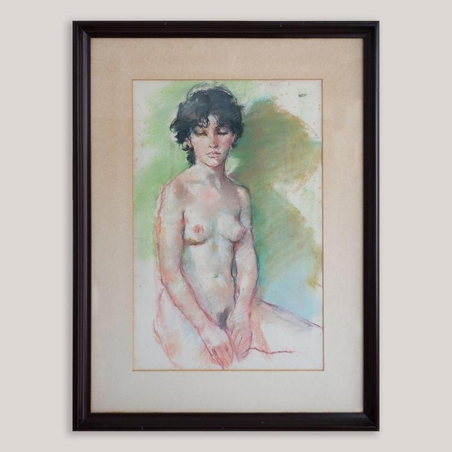 Signed mid-century pastel and watercolour depicting a seated female nude, executed with an expressive yet sensitive...