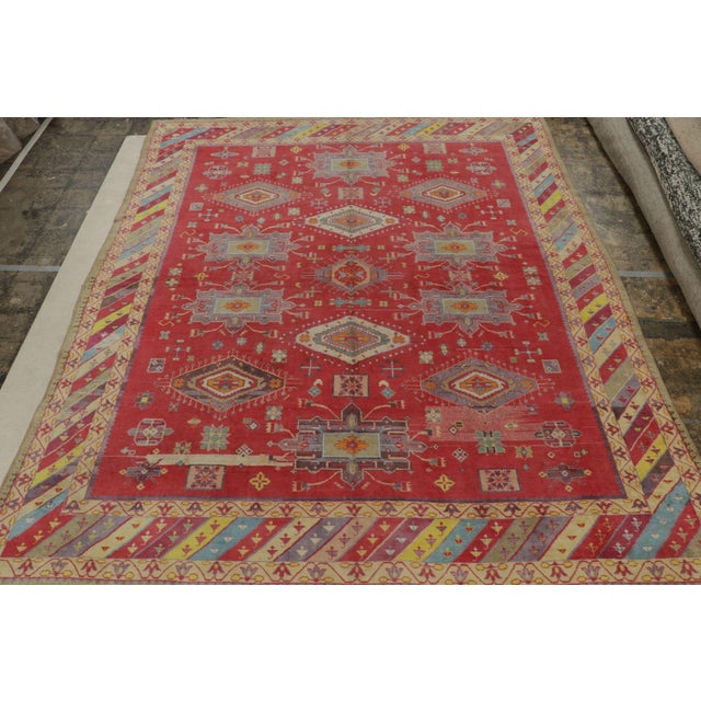 Hand-knotted in originating from India circa 1920-1930, this 9x12 antique Agra rug is an exciting new curation from Rug &...