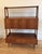 Beautiful and versatile, this free standing unit incorporates a drop lid secretariat/writing desk, three drawers and...