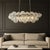 2020s Aloadecor Glam 5-Light 43'' Modern Dining Room Chandelier With Hand-Blown Textured Clear Glass Globes and Chrome Finish For Sale - Image 5 of 9