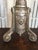 Antique silver-plated copper candlestick with embossed decoration, 19th century, in fair condition with all the signs of...