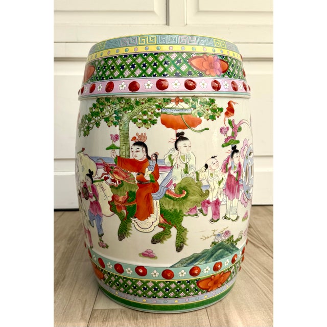 Here is a beautifully detailed mid-20th century Chinese ceramic garden stool featuring wonderfully colorful hand-painted...