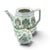 The 1995 Lenox Village Coffee Pot is a fine porcelain collectible piece featuring a white glossy finish, matching lid, and...