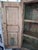 Hand carved Indian cabinet. Reclaimed wood door panels with diamond pattern and floral motifs, circa 1880. Distressed...