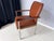 This classic by Sven Ivar Dysthe is a real eye-catcher with its rosewood armrests. The chrome frame and wood have been...