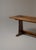 A rare monastery-proportion trestle table from Northern Europe, 8 feet long and 25.75 inches wide. The solid-panel trestle...