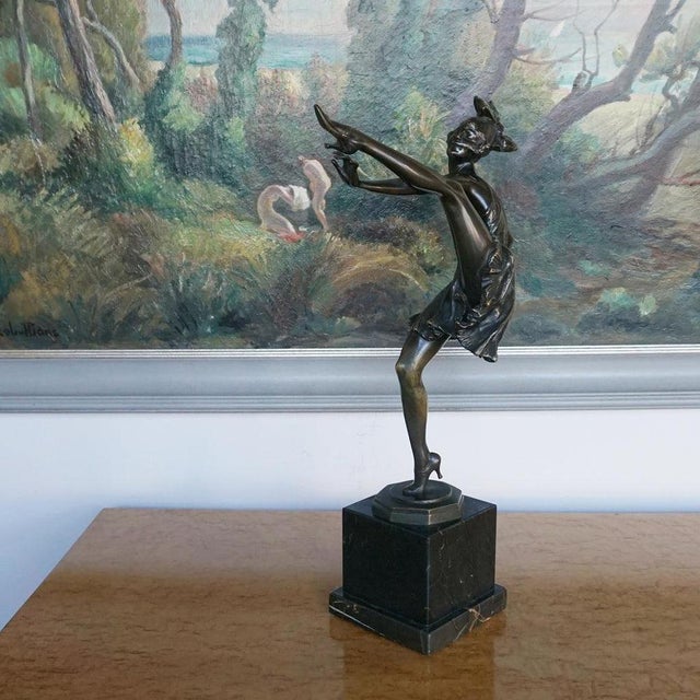 High Kick' an Art Deco bronze figure of a dancing lady. Excellent deep rich patination. Dimensions: H 47cm W 28cm D 12cm...