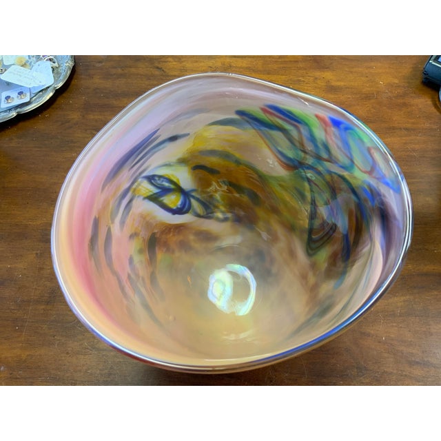 Contemporary art glass vase. Uneven shape and flowing colors lead to an organic aesthetic. Signed on bottom by glass...