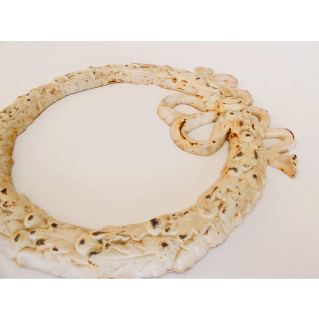 Wonderful rustic garden Laurel wreath with garland, made of cast iron.