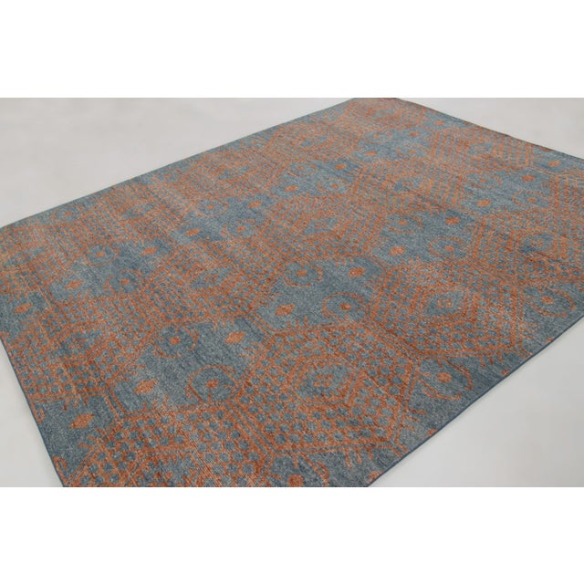 Hand-knotted in wool, this 8x10 contemporary rug joins Rug & Kilim’s Distressed collection. It presents an allover...
