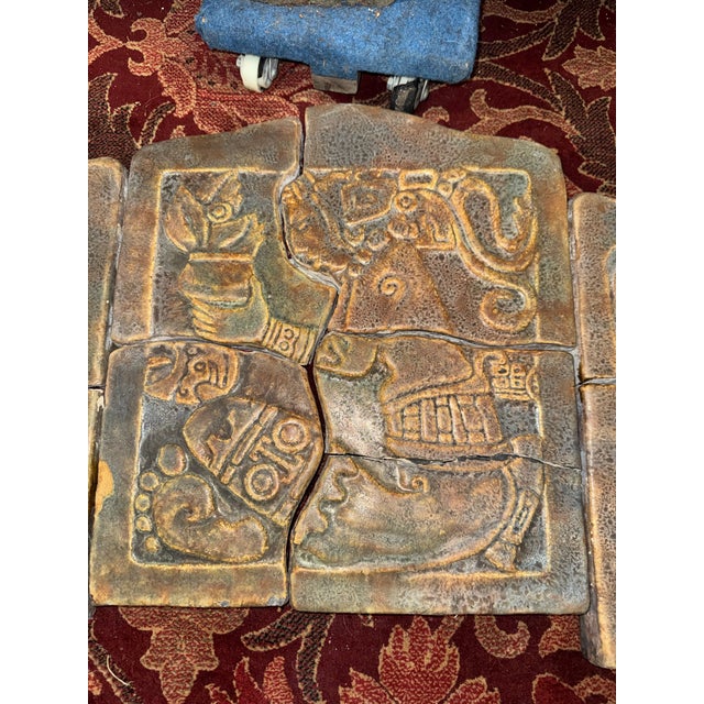 An extraordinary vintage fireplace surround attributed to Calco, featuring a rare and highly decorative Mayan Revival...