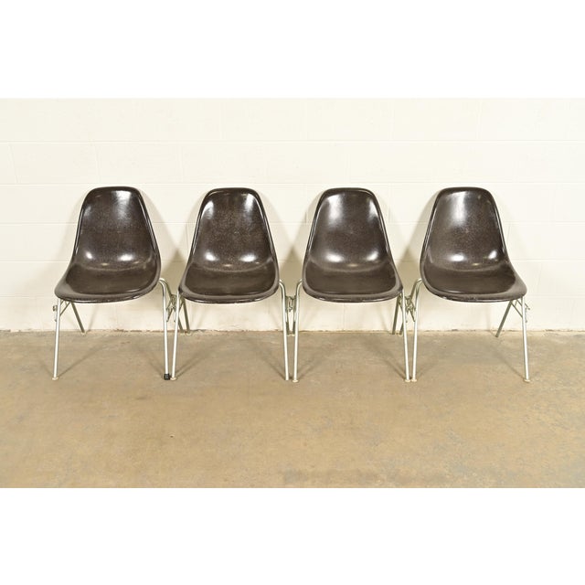 An iconic set of four Eames "DSS" shell side chairs, dining chairs, or office chairs By Charles & Ray Eames for Herman...