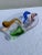 This vintage art glass decorative bowl by Murano is a really stunning find. The organic shape of the bowl with the various...