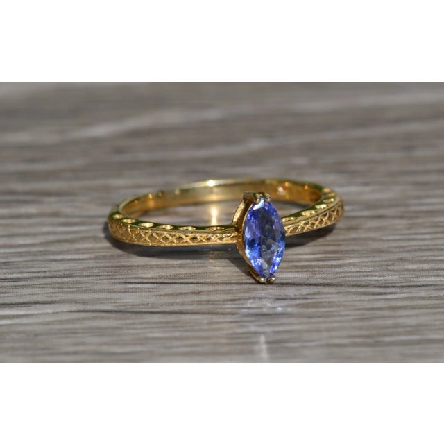 2000 - 2009 The Bluet: Ladies Engagement Style Ring in Yellow Gold set with Navette Shaped Tanzanite For Sale - Image 5 of 9