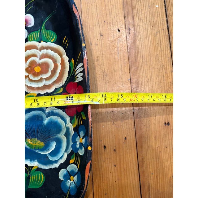 The item is a vintage Mexican hand-carved and hand-painted wooden bowl, also known as a Batea. These bowls are often used...