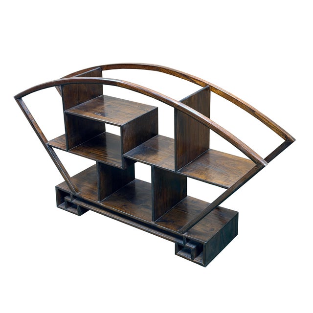 Crafted from dark, polished wood with a rich, visible grain, this tabletop display shelf—often referred to in Asian...