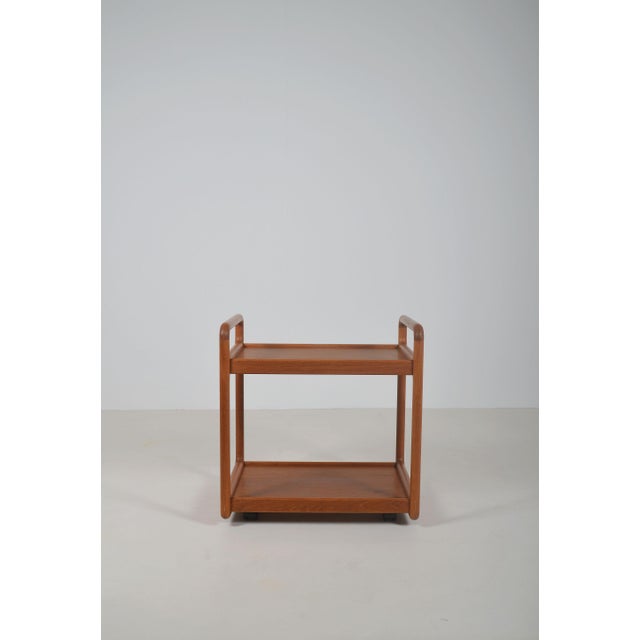 Danish serving trolley designed in the 1960s by Poul Cadovius. This teak wood trolley was manufactured by Cado. The...