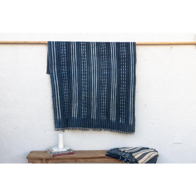 Hand-woven by master weavers of the Mossi and Dioula traditions in Burkina Faso, West Africa, these vintage textiles are...