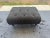 Vintage tufted upholstered ottoman with floral fabric and turned wood legs. Traditional bench, footstool, or coffee table...
