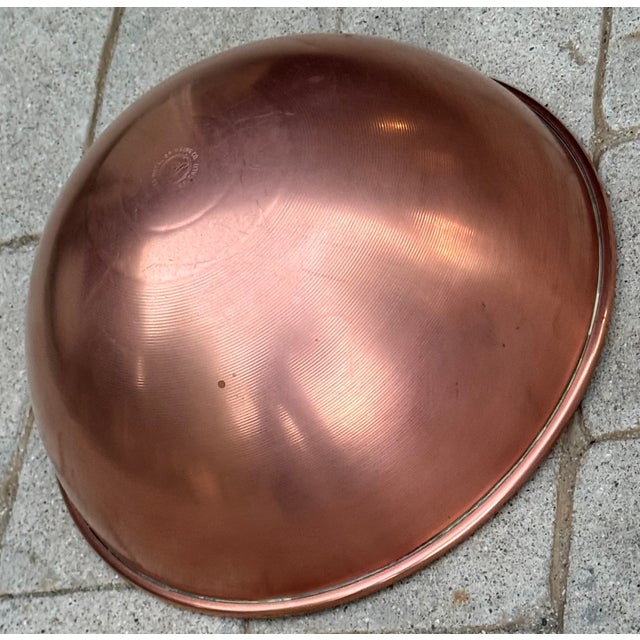 Quality copper mixing bowl made by Atlas Metal Spinning Company of South San Francisco. It has round bottom rolled edge...