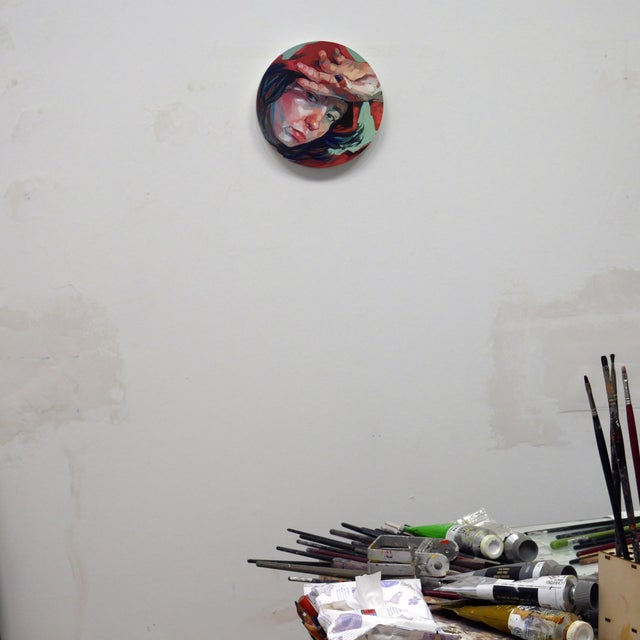 Contemporary Captured Moment 3 by Ale Casanova | Oil on panel Portrait of a woman in a red hoodie. For Sale - Image 3 of 4