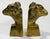 Substantial vintage pair of solid brass rams head bookends featuring great detail to horns and bust. Heavy. Nice patina.