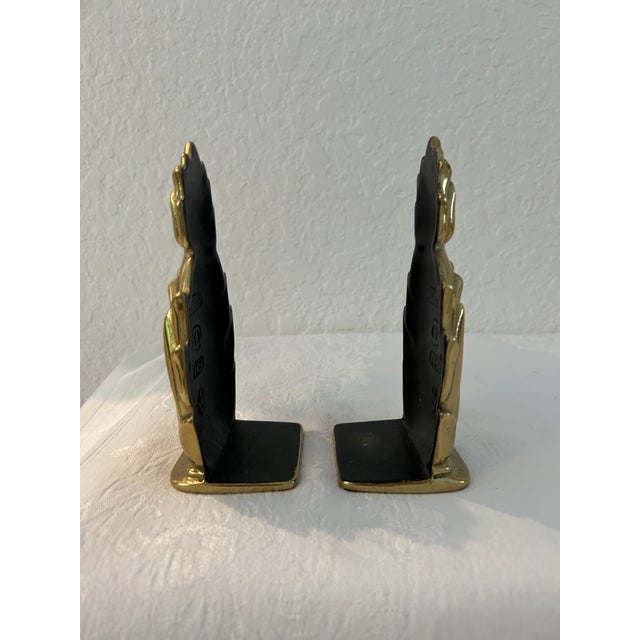 Stylish pair of solid, polished cast brass bookends in a figural pineapple motif. Marked "Newport." Great condition.