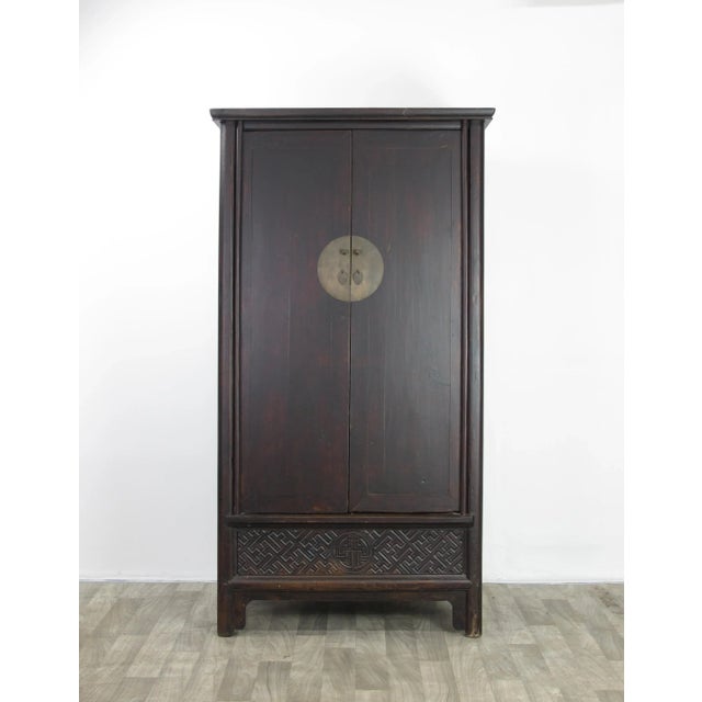 This type of armoire cabinet was also called “noodle cabinet” because the round moldings surrounding the cabinet resemble...