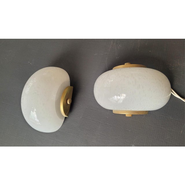 Pair of shell-shaped wall lights in refined hand-blown Murano glass and golden metal Art Deco style European Plug (up to...
