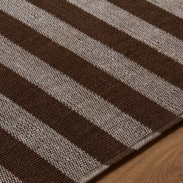 Transform your space into a serene coastal haven with the Harbor collection's exquisite handmade rug. Crafted with care in...
