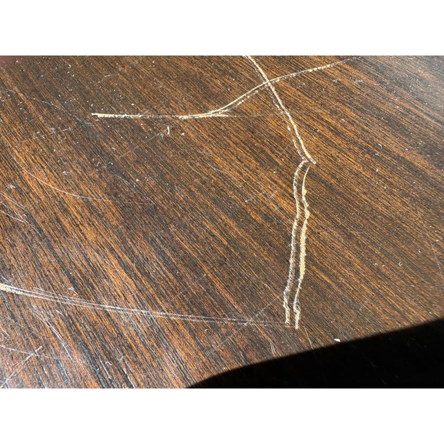 Elevate your living space with this striking pair of vintage Michael Taylor designed end tables. Showcasing Taylor's...
