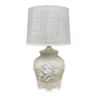 1970s Chinoiserie Relief Porcelain Celadon-Cream Table Lamp With Floral Motif & Textured Shade For Sale