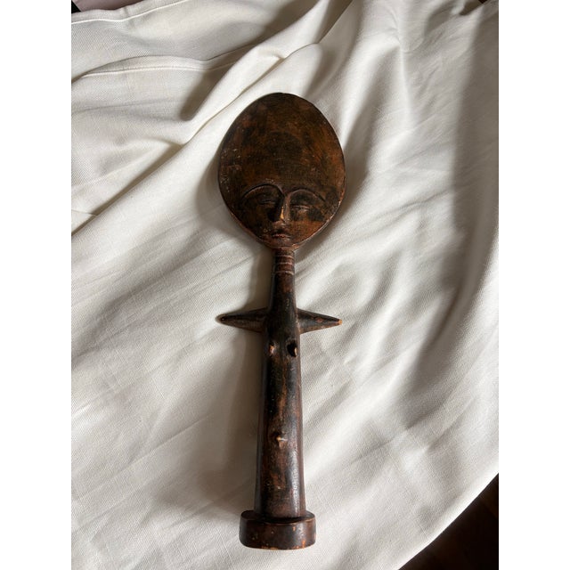 Striking vintage hand-carved African wood figure inspired by the traditional Akan Akua’ba fertility figures of Ghana. The...