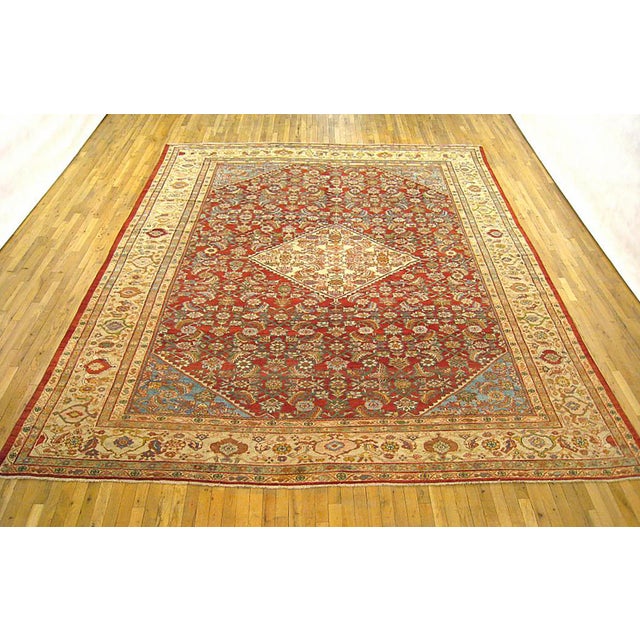 Antique Persian Sultanabad Rug, Room size, circa 1910 A one-of-a-kind antique Persian Sultanabad oriental carpet with a...