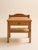 A charming pair of vintage pine bedside tables featuring a simple, utilitarian silhouette softened by a gently curved...
