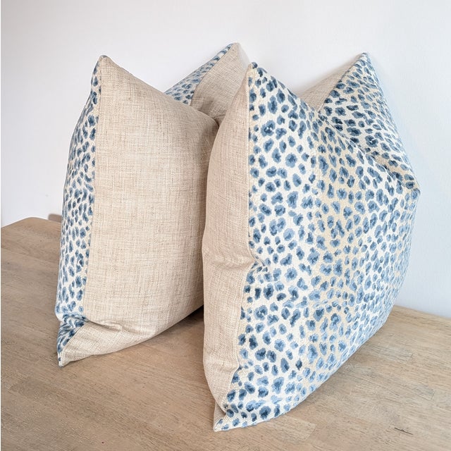 Cowtan & Tout Ocelot cut velvet pillows in azure, with coordinating natural linen backs. Invisible zippers and...
