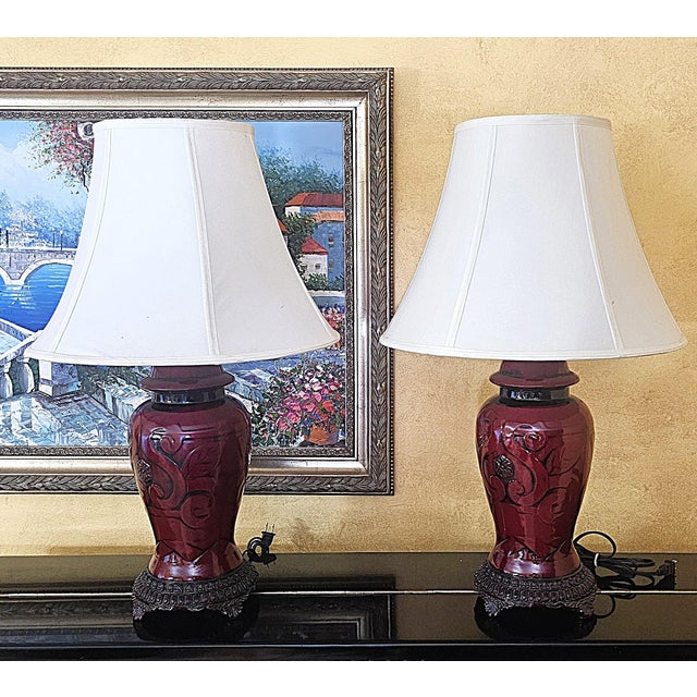 Elegant pair of Chinoiserie-style ginger jar table lamps, likely circa early 2000s, blending Hollywood Regency glamour...