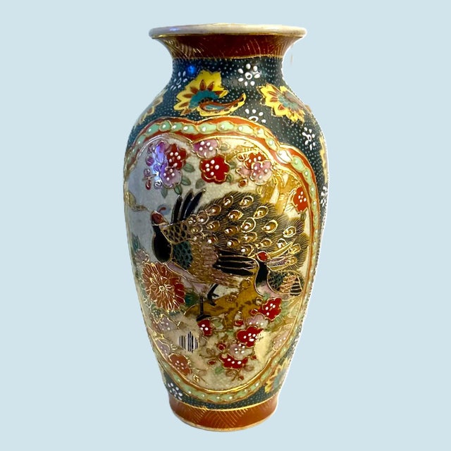 Vintage Japanese Vase with peacocks, flowers, gold Trim and moriage beading. Extraordinary in design and intricate detail,...